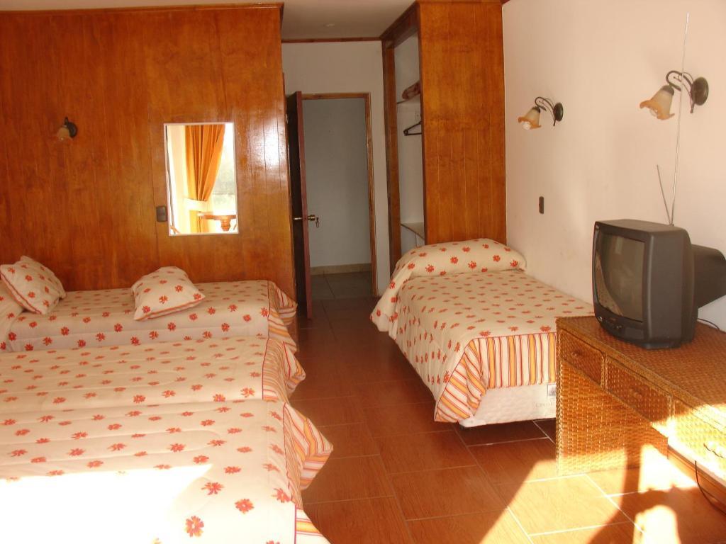 Hotel Victoria Hanga Roa Chambre photo